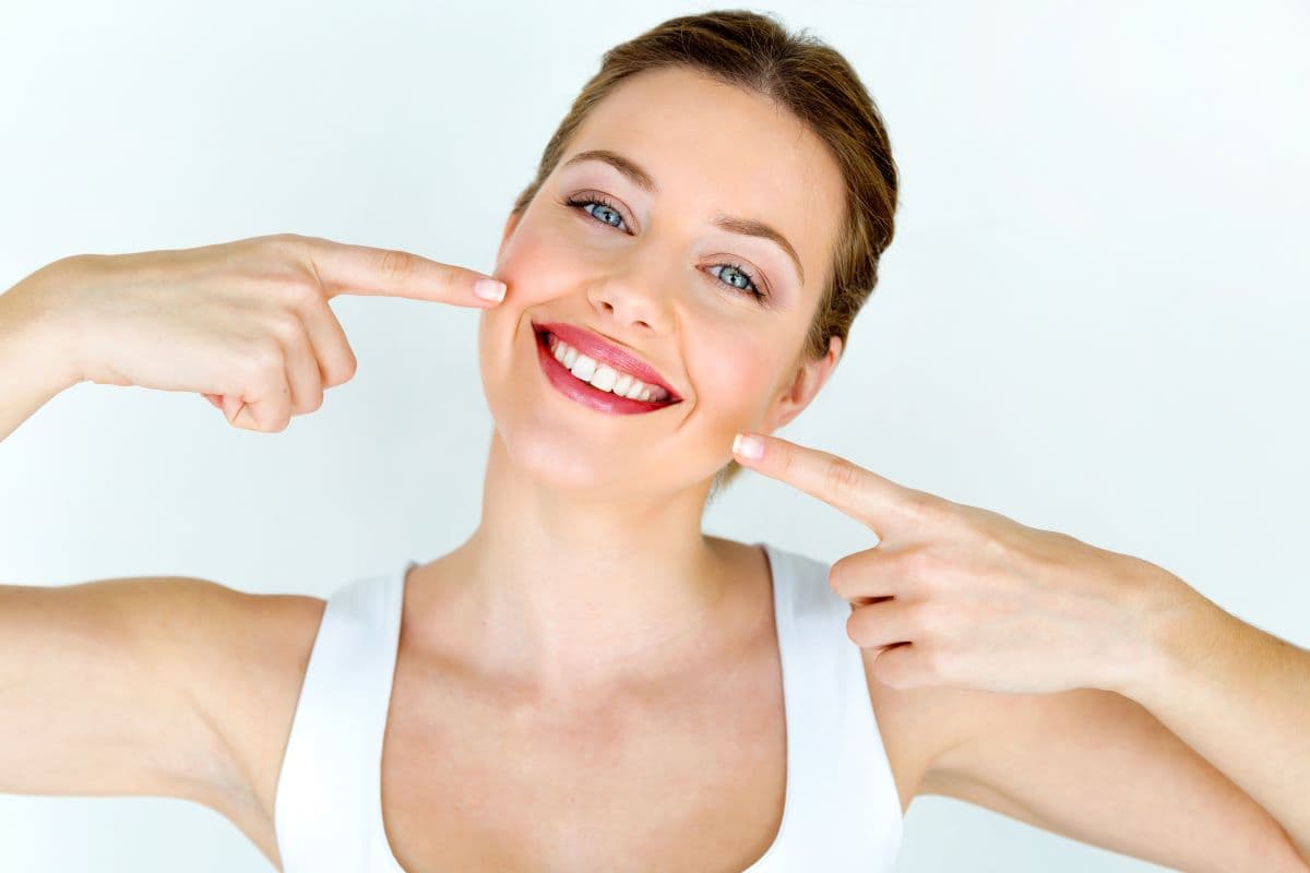 Can a dental crown be removed safely and reused, or does it have to be cut off and destroyed?