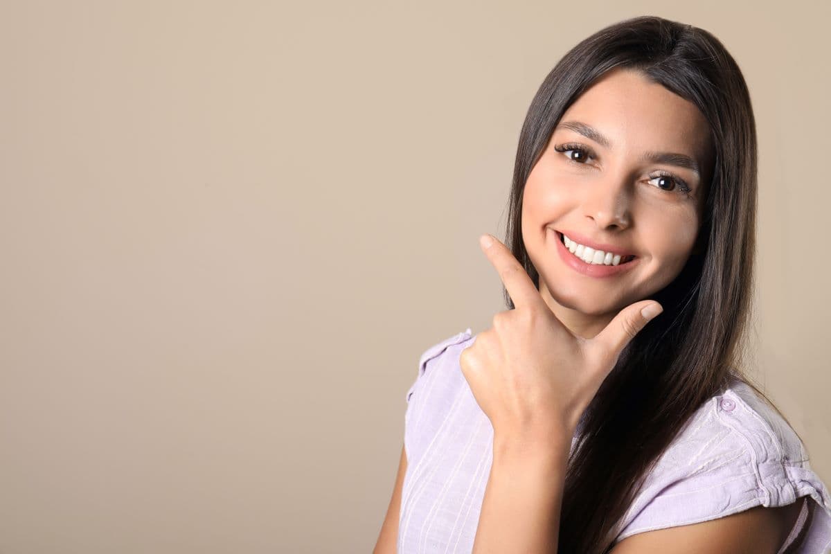 Can Tooth Contouring Fix a Front Tooth That Looks Slightly Longer Than the One Next to It?