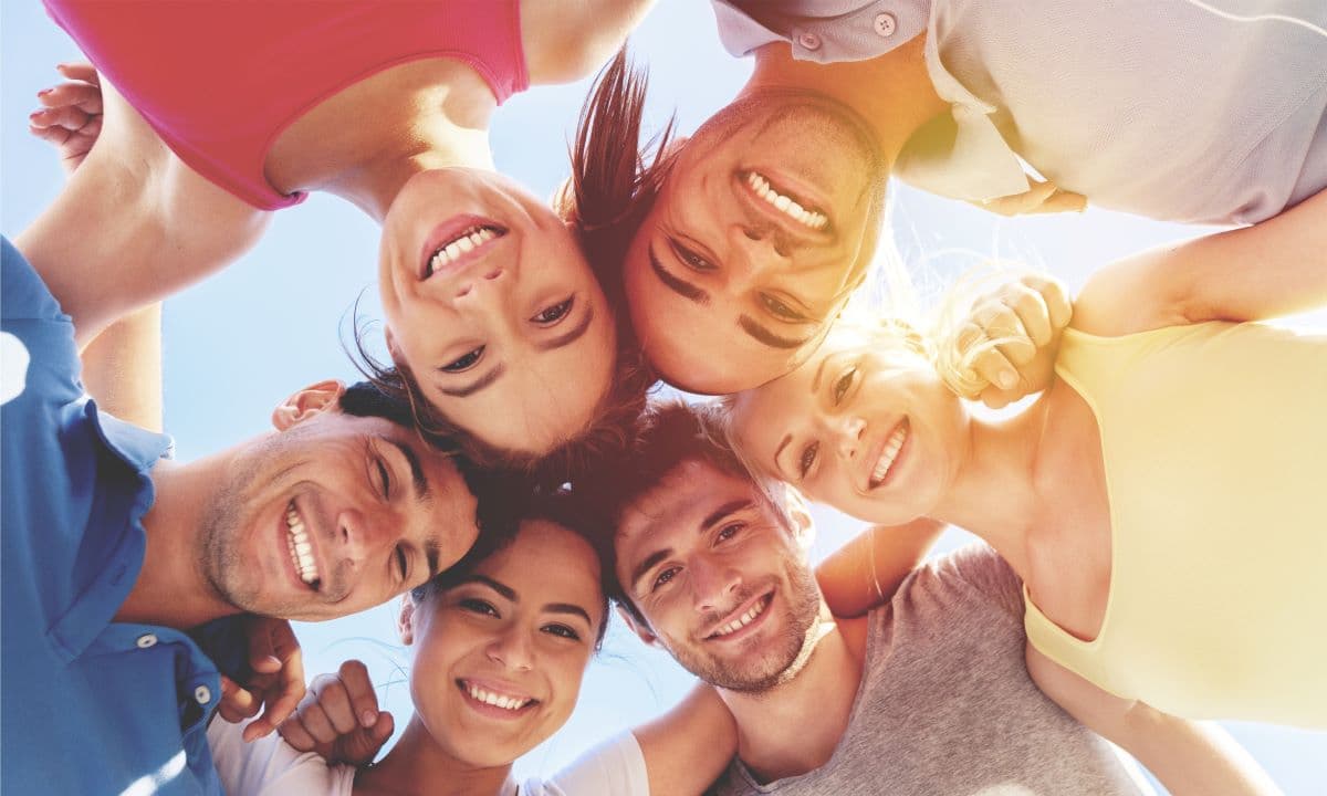 How Can I Tell If a Partially Erupted Wisdom Tooth Has Started to Decay Underneath the Gum Flap?